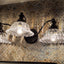 Luces tocad. baño 3 luces negras fijación