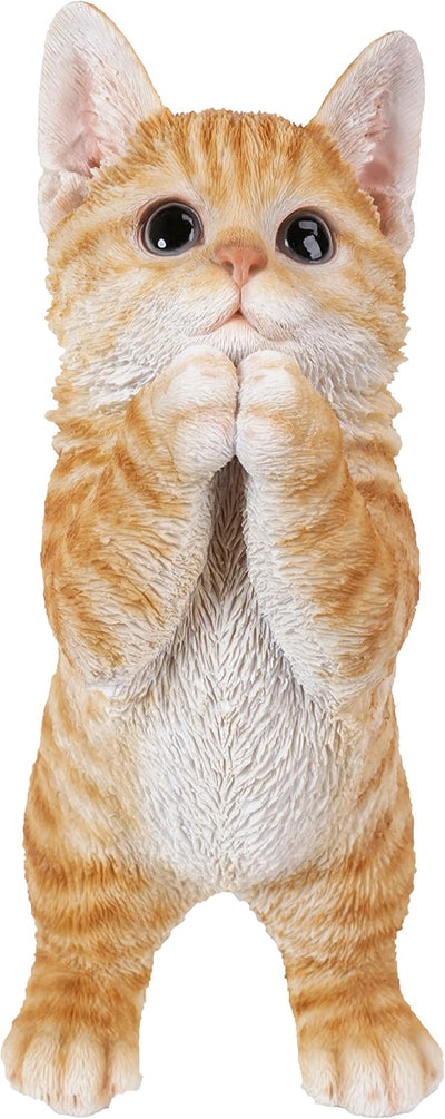 Estatua gatito atigrado jardín