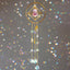 Atrapasoles de amatista y cristal con luz deslumbrante