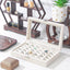 Caja anillos terciopelo con tapa 30 ranuras beige