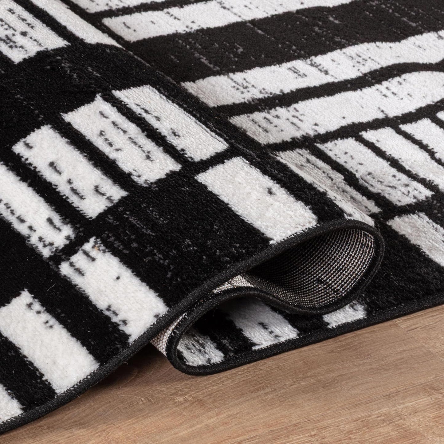 Alfombra geométrica blanco y negro pelo bajo 4x6ft