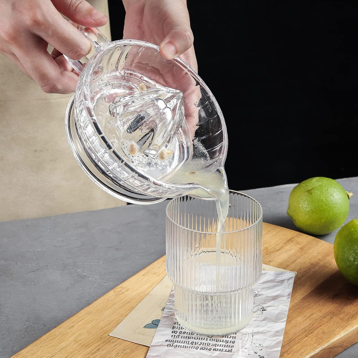 Exprimidor manual de vidrio con mango y boquilla para cítricos