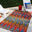 Alfombra rectangular ikat 10x14pulg multi/borgoña