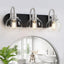 Lámpara tocador 3 luces vidrio transparente base metal negro