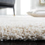 Alfombra marfil 10x14ft Safavieh Milan Shag