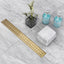 Drenaje lineal ducha 48" acero inox 304 cepillado oro
