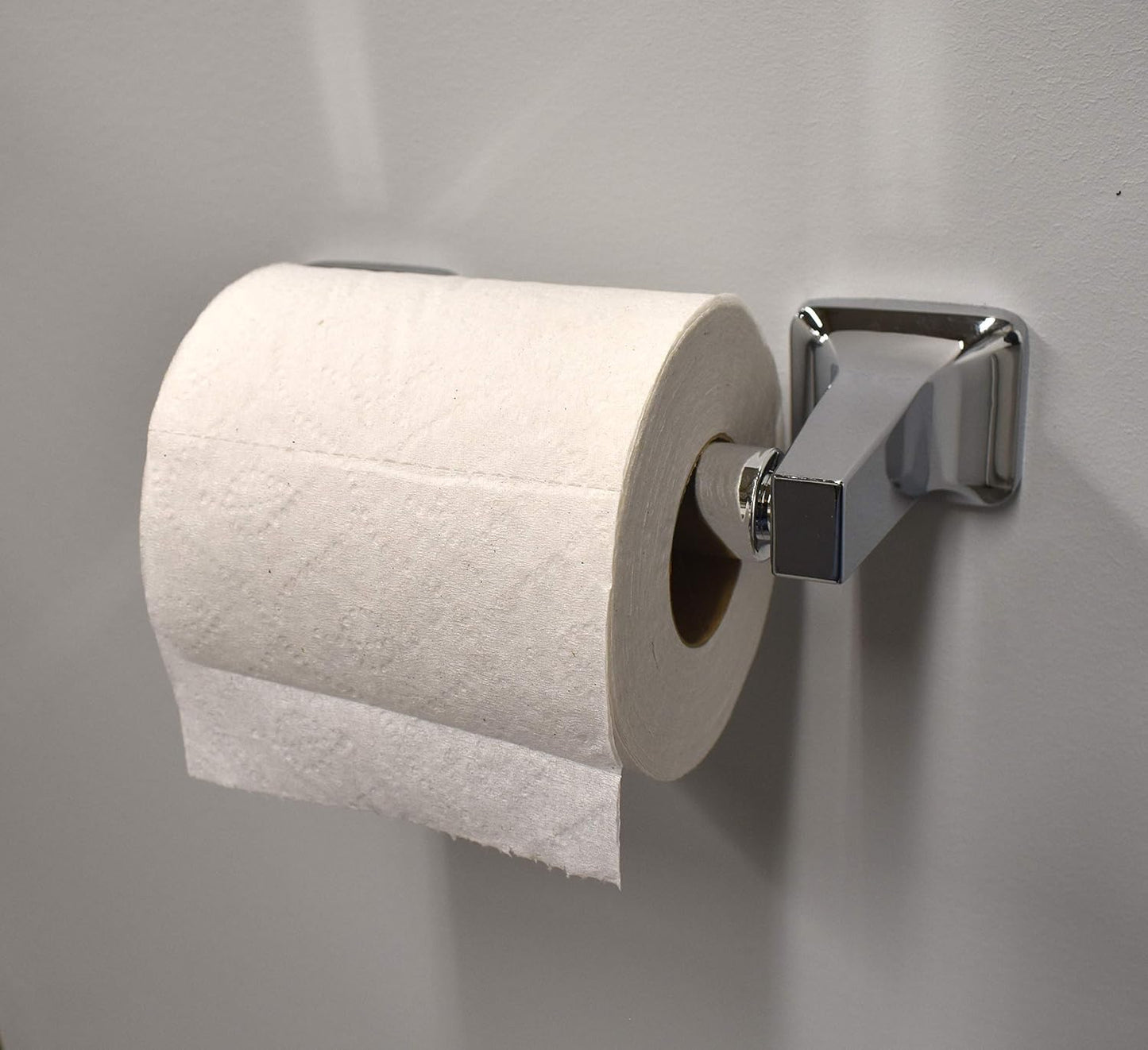 Soporte universal rodillo papel higiénico resorte cromado
