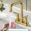 Grifo lavabo 4" 2 agujeros dorado cepillado ADA comp