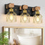 Luz de tocador 3 luces negra y dorada para baño y sala