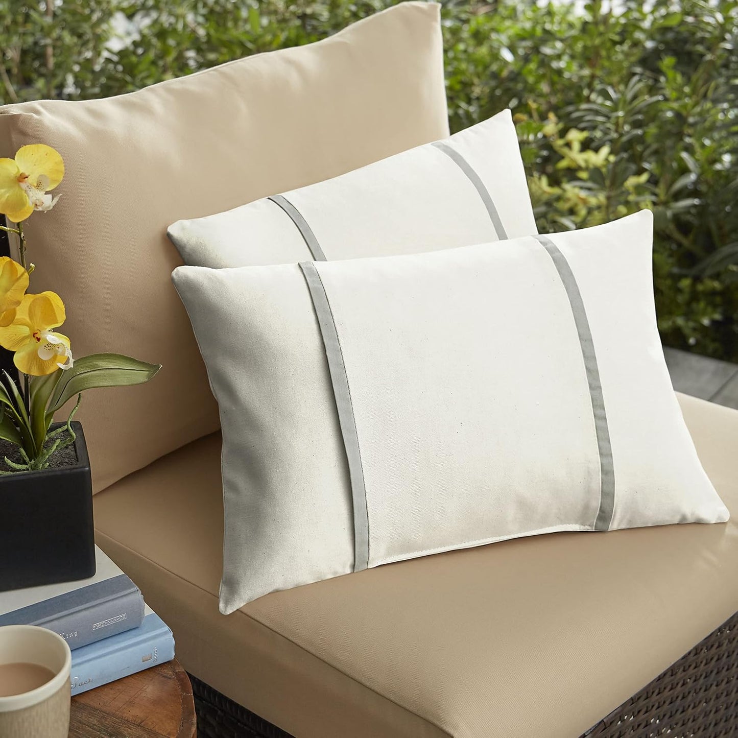 Almohadas lumbares Sunbrella lona marfil y gris carbón set 2