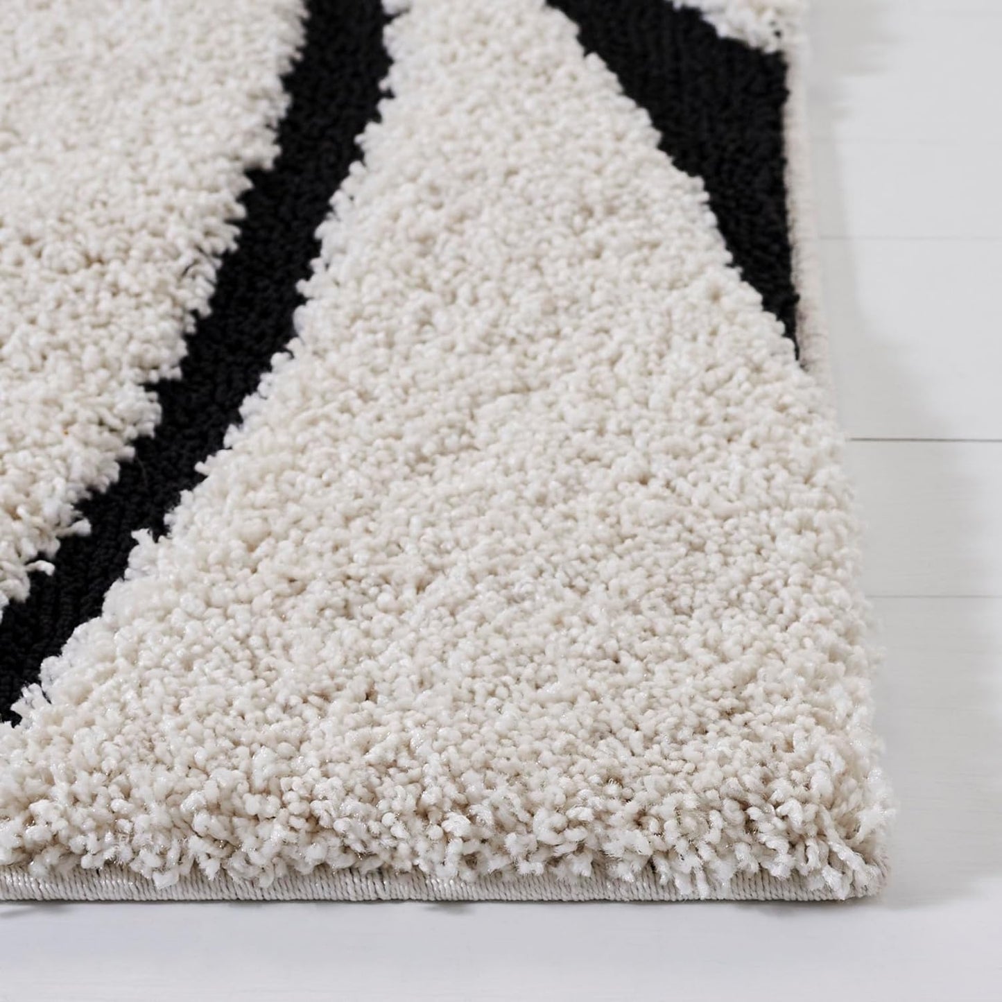 Alfombra decorativa 2'3"x5' marfil y negro no pelusa