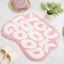 Alfombra baño texto inglés rosa claro antiderrap 25x21pulg