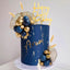 Decoración bohemia para tartas doradas y azules hojas palma boda