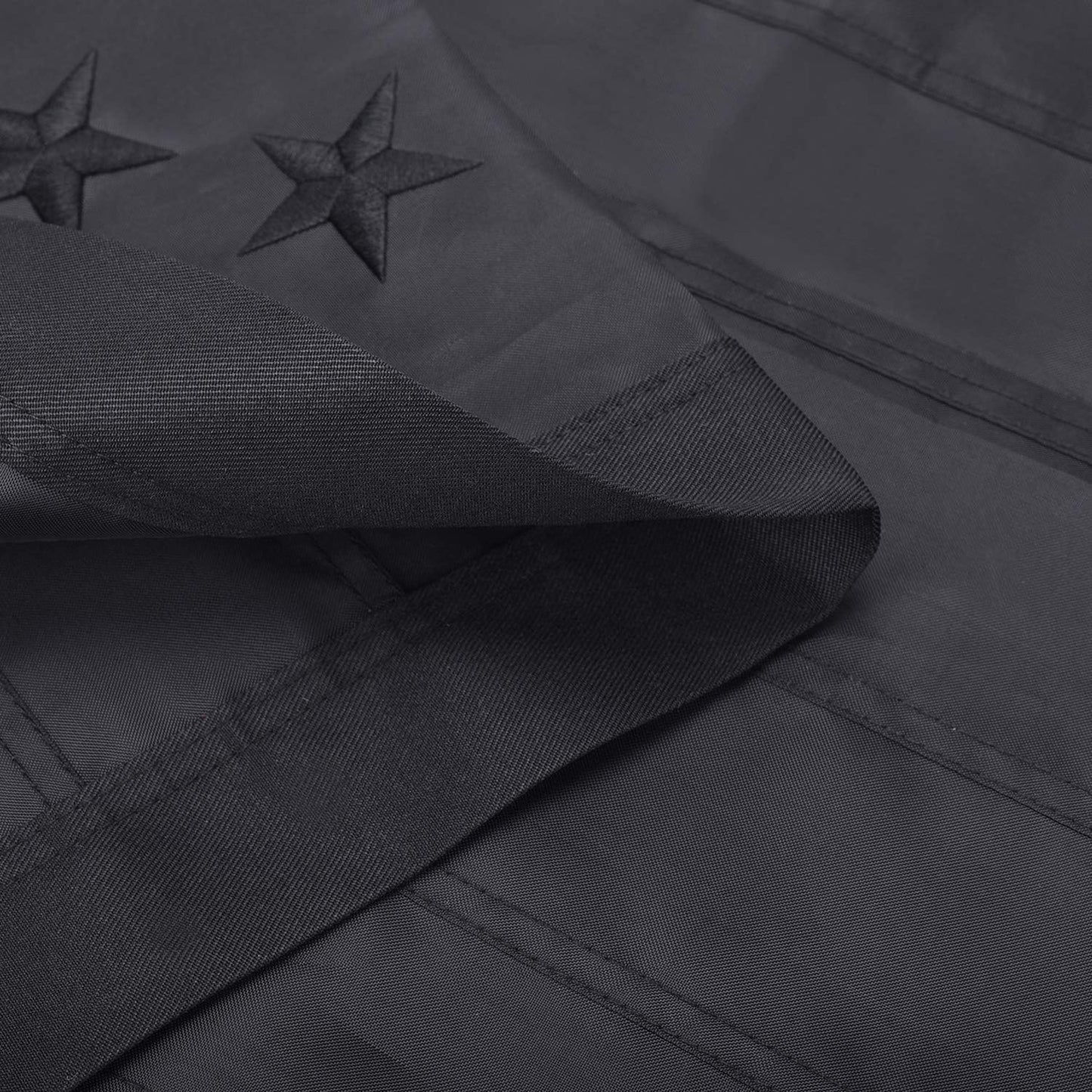 Bandera estadounidense negra nailon estrellas bordadas