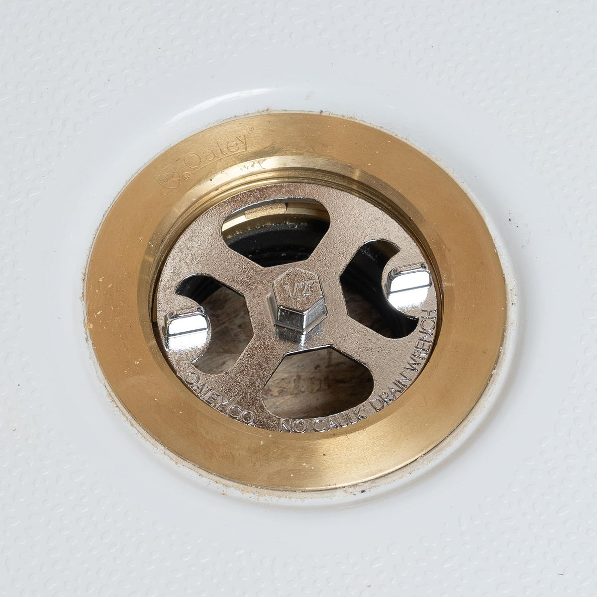 Llave drenaje ducha latón plástico acero inox