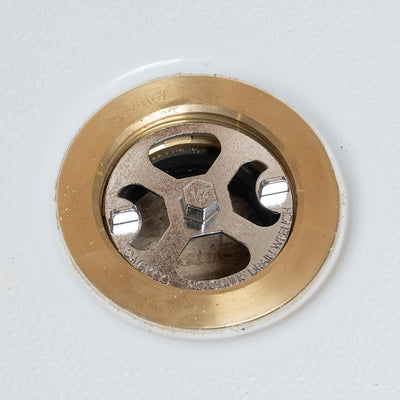 Llave drenaje ducha latón plástico acero inox