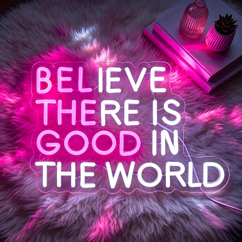 Letrero neón rosa y blanco texto Believe There is Good
