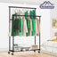 Perchero doble con ruedas 45" para ropa resistente negro