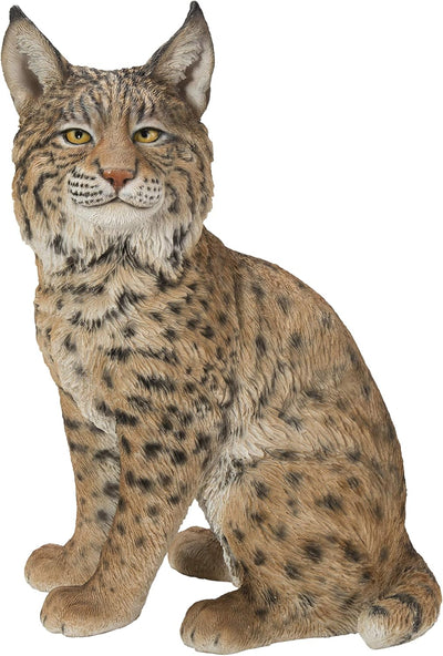 Estatua Bobcat sentado amarillo y negro