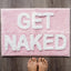 Alfombra baño texto Get Naked antiderrap rosa claro