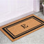 Felpudo monograma E 18x30pulg borde negro