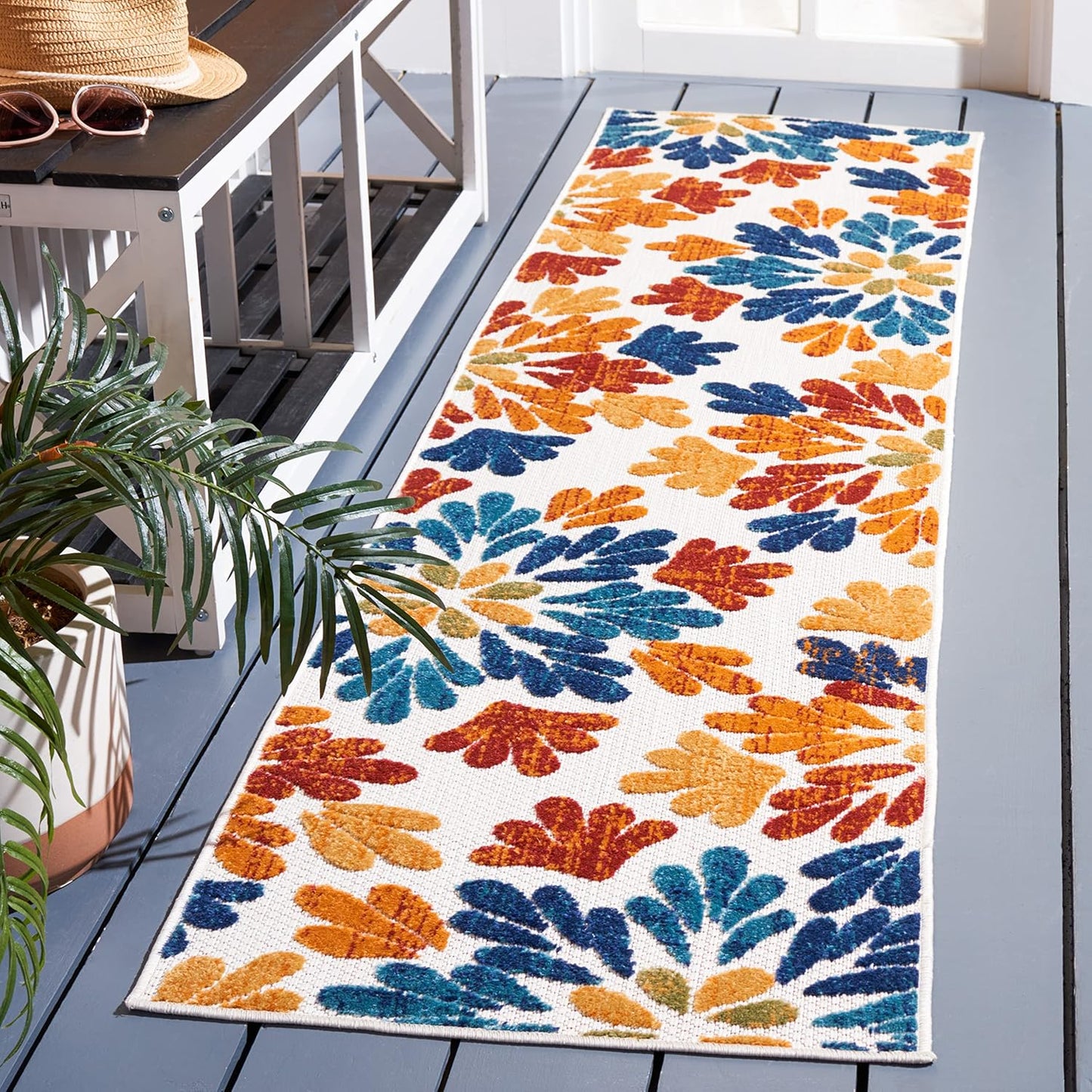 Alfombra exterior lavable Cabaña 2x6ft color crema y rojo