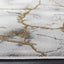 Alfombra acento 2x3ft gris y dorado resistente manchas