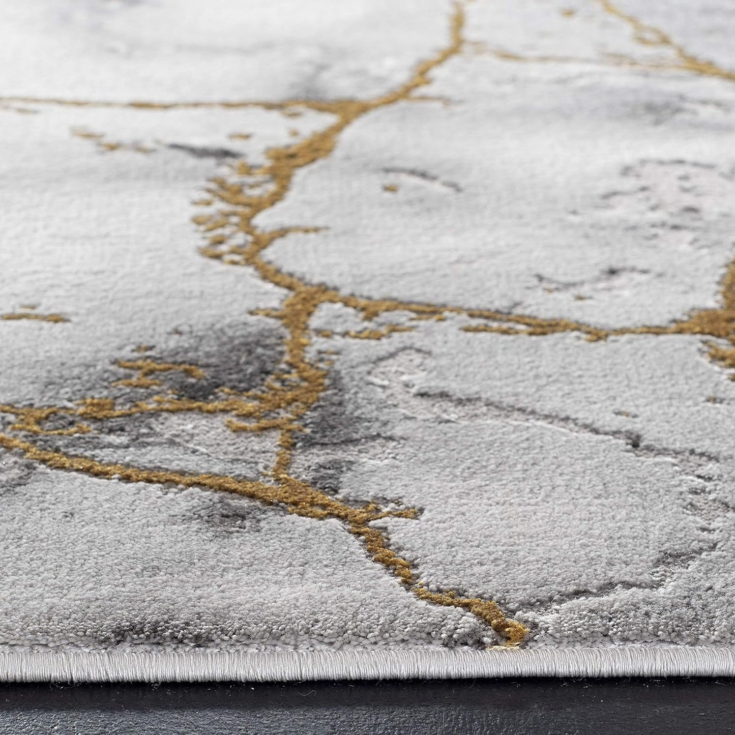 Alfombra acento 2x3ft gris y dorado resistente manchas