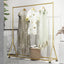Perchero dorado con ruedas para hogar y boutique 59"