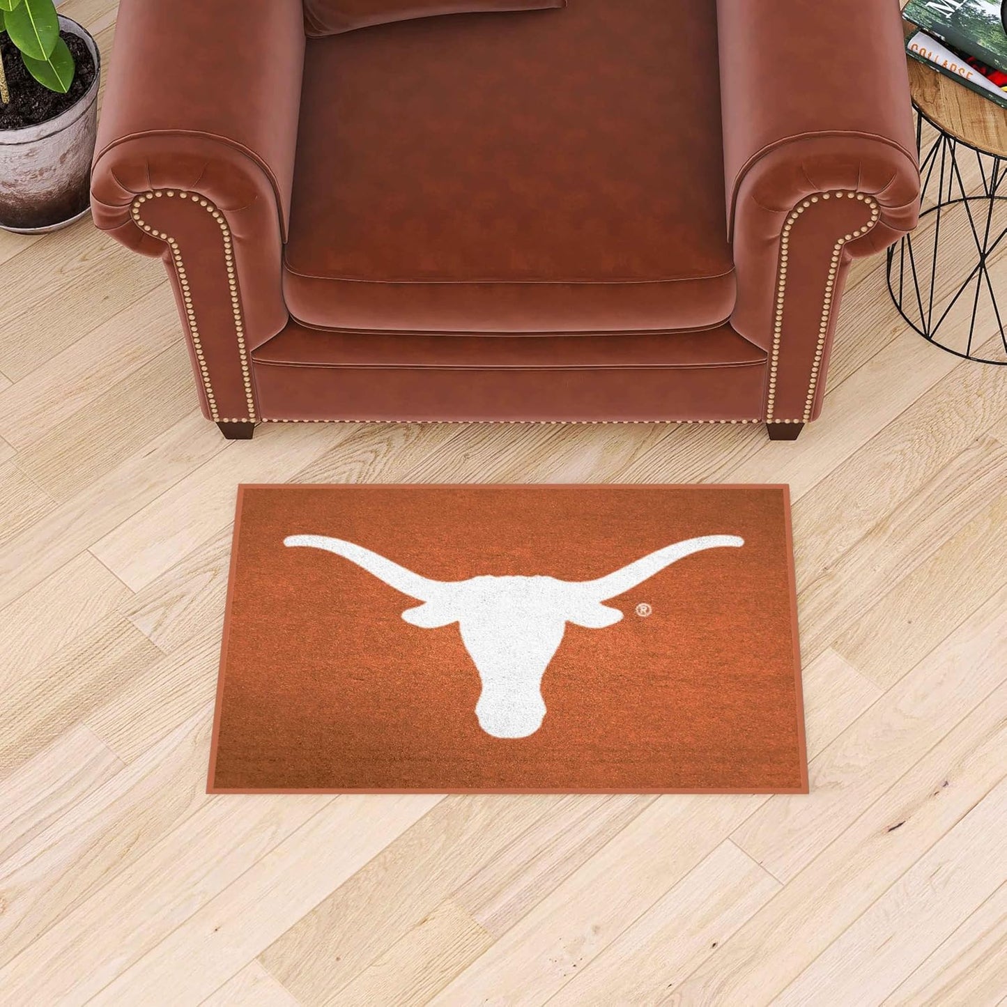 Alfombra decorativa NCAA 19x30" color equipo