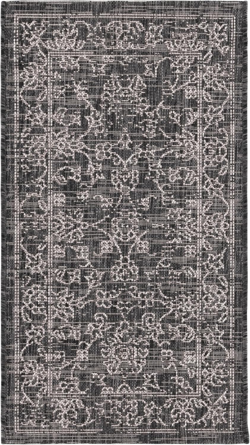 Alfombra exterior lavable 2x3'7" negro y marfil patio puerta