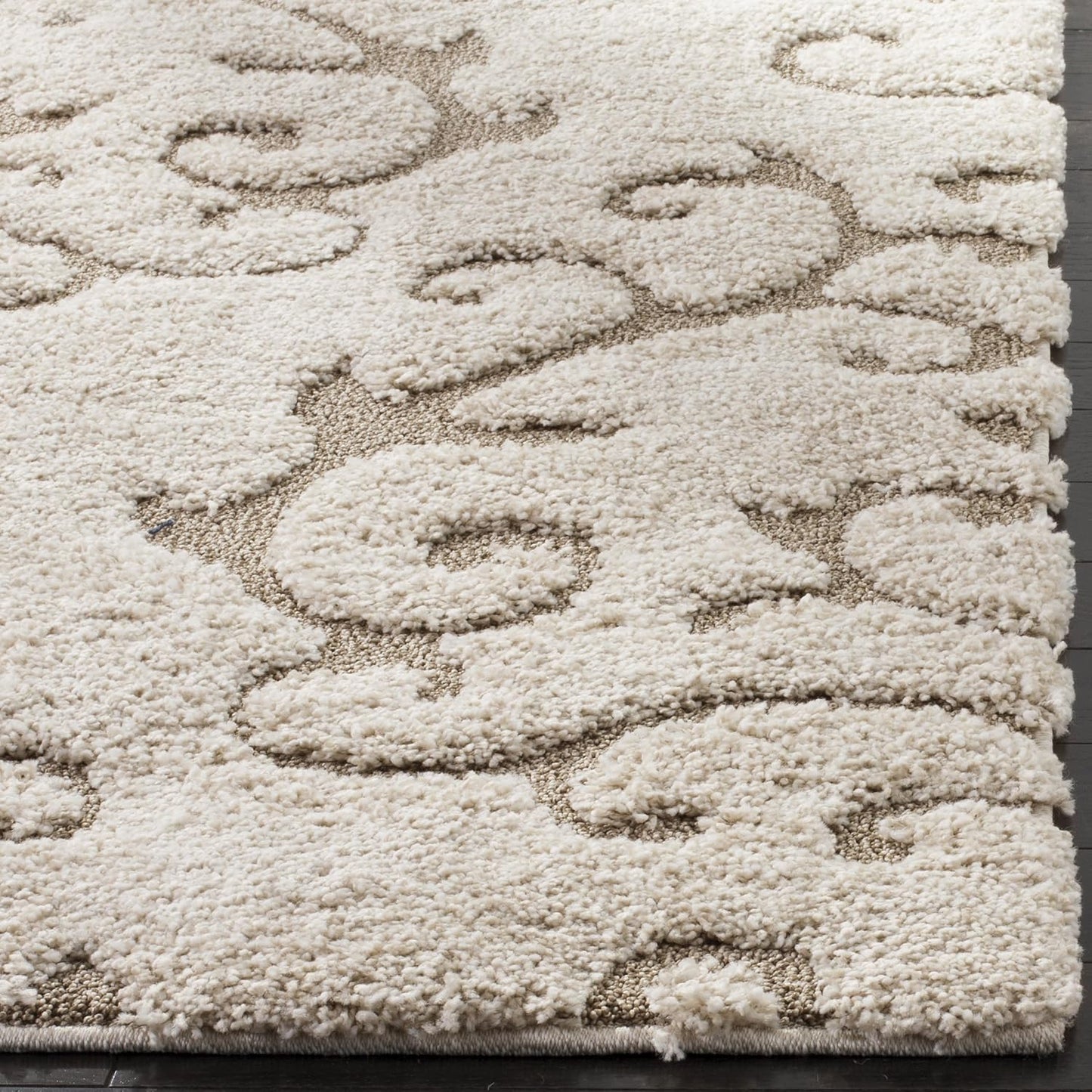 Alfombra área 9x13ft color crema y beige diseño volutas