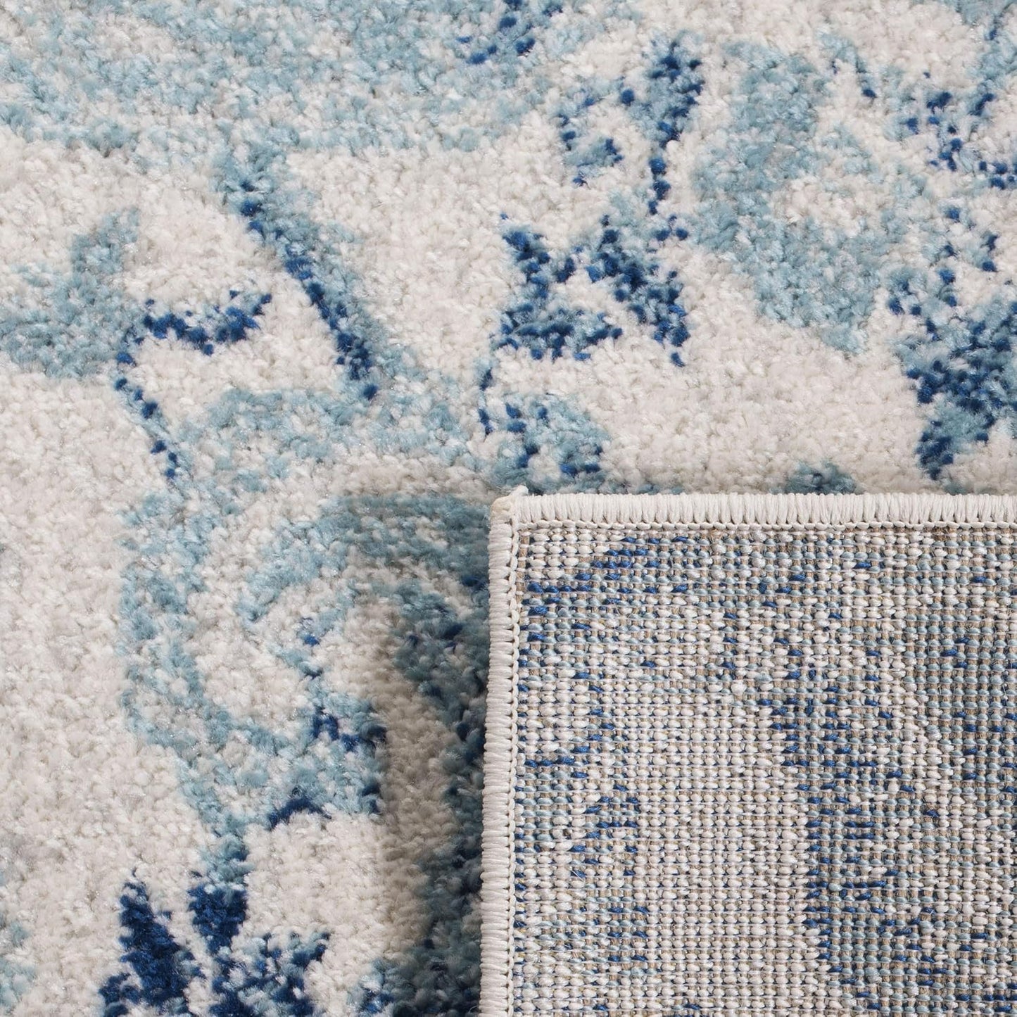 Alfombra decorativa 2'3x4' crema y turquesa paisley