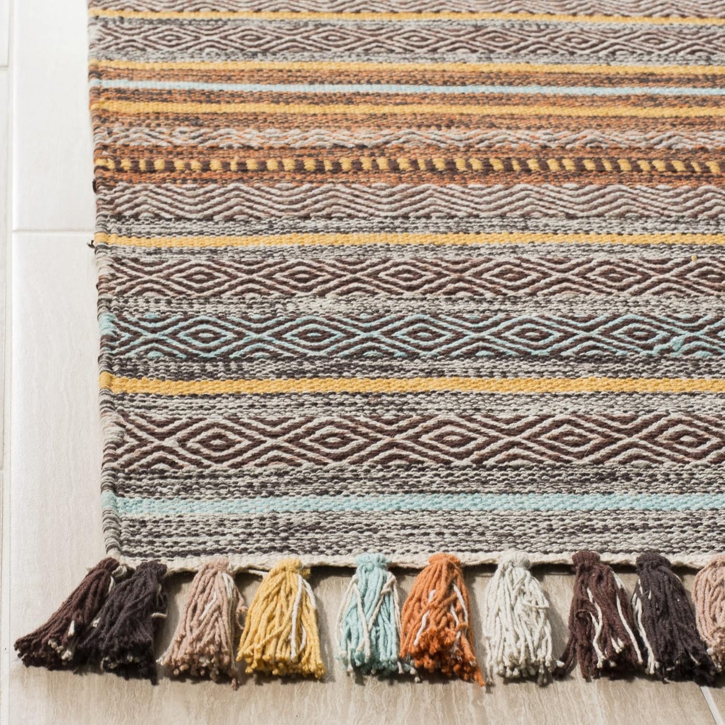 Alfombra decorativa 2'6x4' estilo boho turquesa y marrón