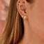 Aretes deportivos novedosos para mujer