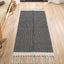 Alfombra pasillo baño 2x4.3ft tejido algodón borlas color negro