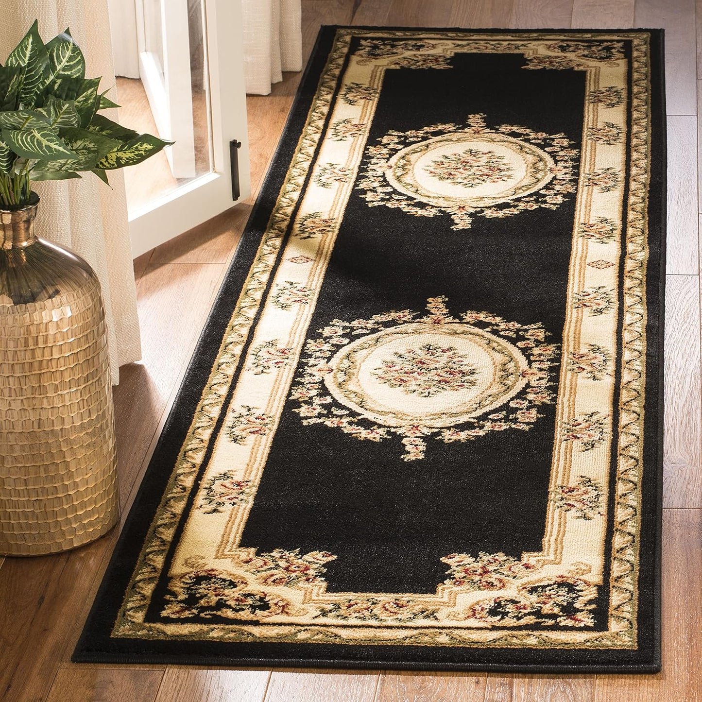 Alfombra pasillo 2'3x8' color negro y marfil