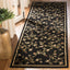 Alfombra pasillo 2'3"x8' color negro diseño floral no pelusa