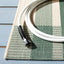 Alfombra exterior lavable 4x5'7 patrón cuadros verde beige
