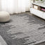 Alfombra geométrica rayas 4x6ft negro/marfil exterior