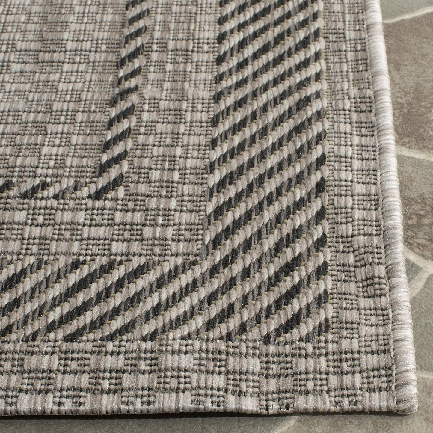 Alfombra decorativa impermeable 2x3ft7pulg beige/negro